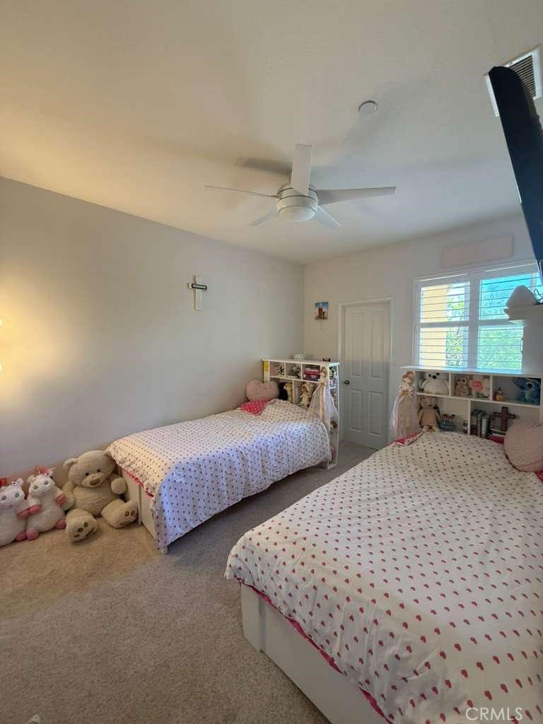 2931 Esperanza Way, Unit B Simi Valley, CA 93063 - Photo 39 of 49 a bedroom with two beds and window