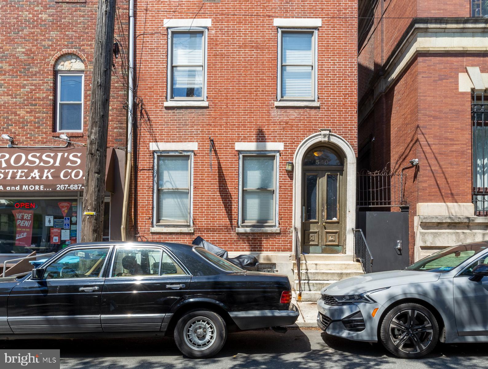 540 North 4th Street, Unit D Philadelphia, PA 19123 - Photo 16 of 17 a front view of a house with parking space