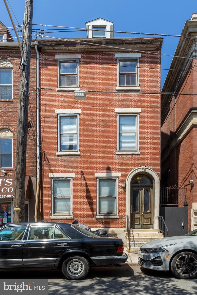 540 North 4th Street, Unit D Philadelphia, PA 19123 - Photo 17 of 17 a front view of a house with parking space
