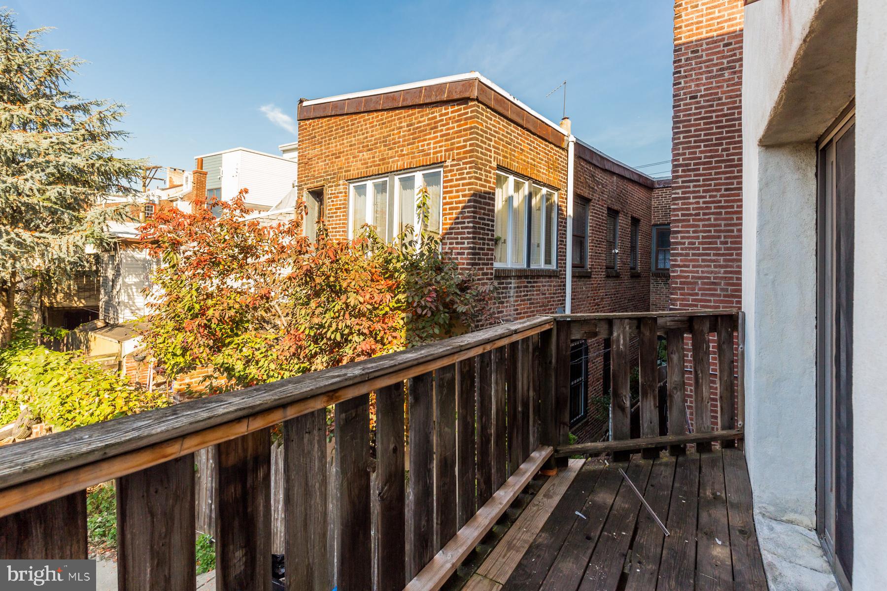 540 North 4th Street, Unit D Philadelphia, PA 19123 - Photo 8 of 17 a view of a house with wooden fence