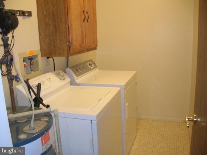 7087 Catalpa Road Frederick, MD 21703 - Photo 7 of 12 Full sized washer and dryer, sep. laundry room