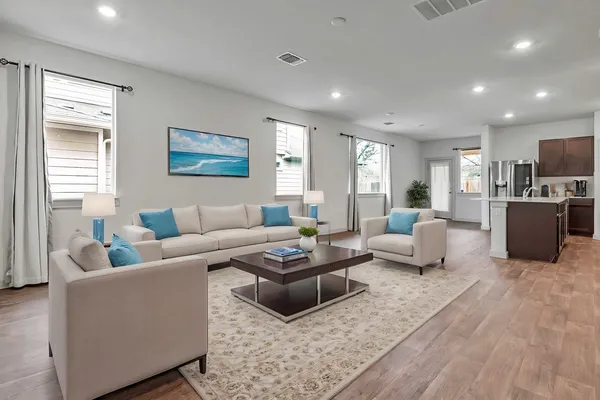 a living room with furniture and a couch