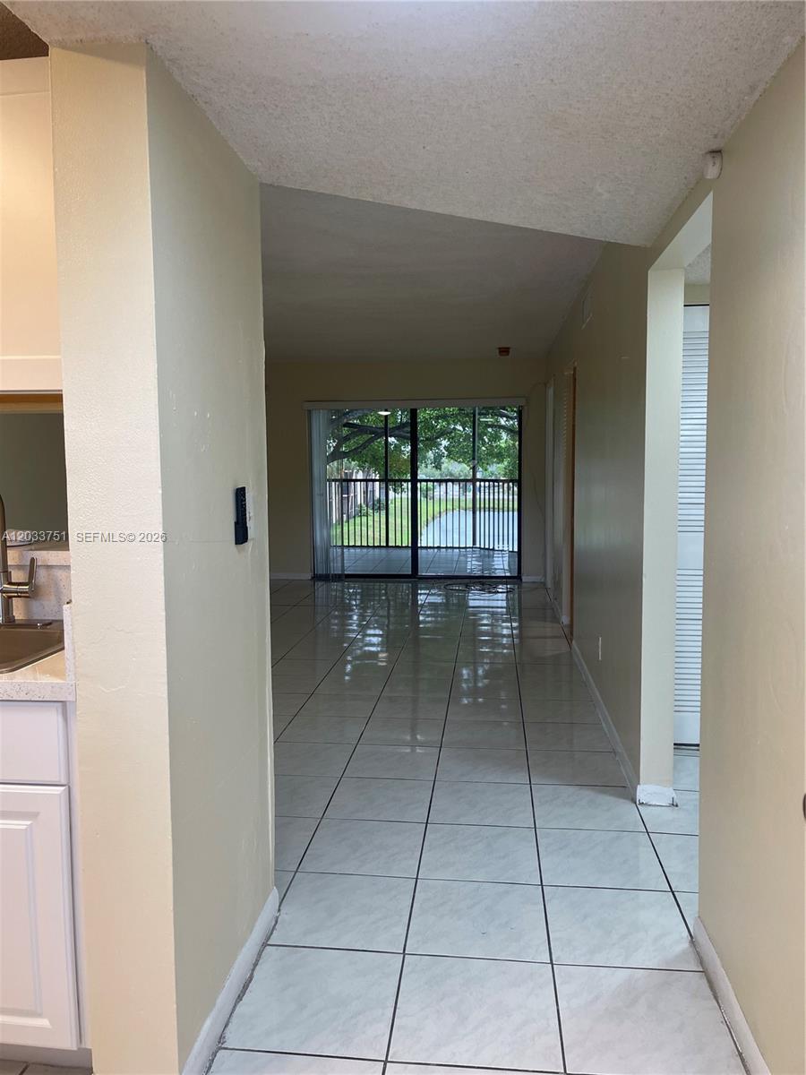 3252 Foxcroft Road, Unit 307 Miramar, FL 33025 - Photo 3 of 41 From Entrance