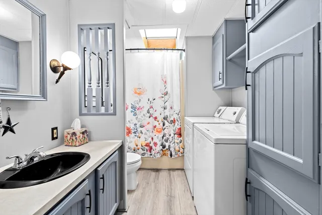 a kitchen with a refrigerator and a stove