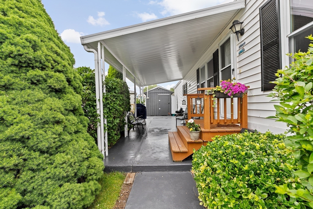 28 Dot's Lane Wareham, MA 02558 - Photo 21 of 25 a front view of a house with garden
