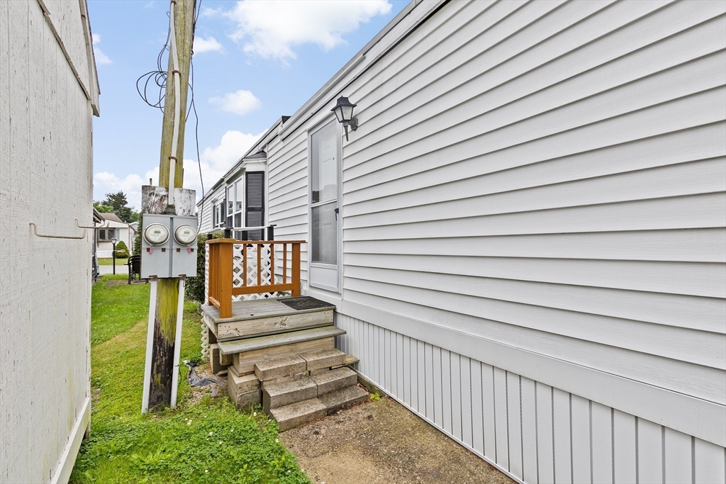 28 Dot's Lane Wareham, MA 02558 - Photo 24 of 25 a view of a porch with wooden floor