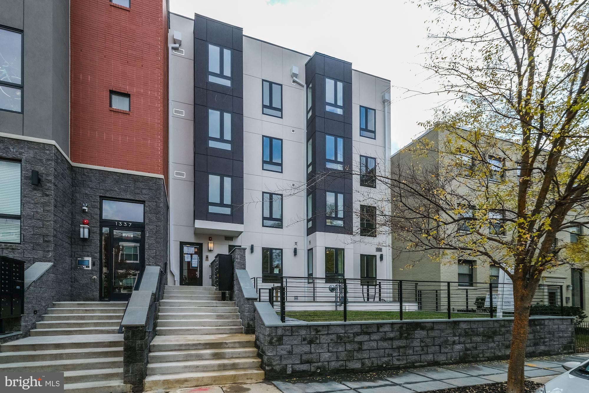 1331 K Street Southeast, Unit 302 Washington, DC 20003 - Photo 1 of 13 a view of a building with a outdoor space