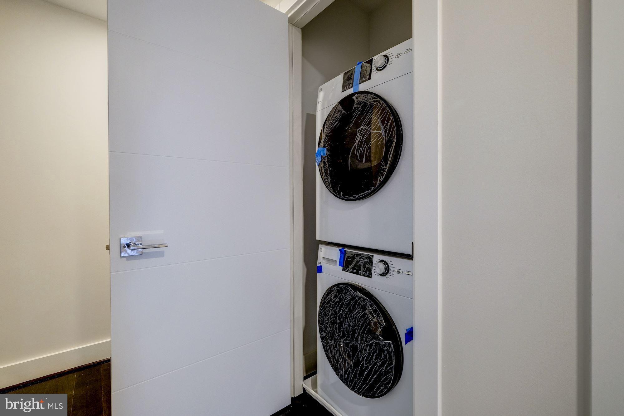 1331 K Street Southeast, Unit 302 Washington, DC 20003 - Photo 10 of 13 a view of a small space with washer and dryer