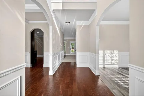 a view of entryway with wooden floor