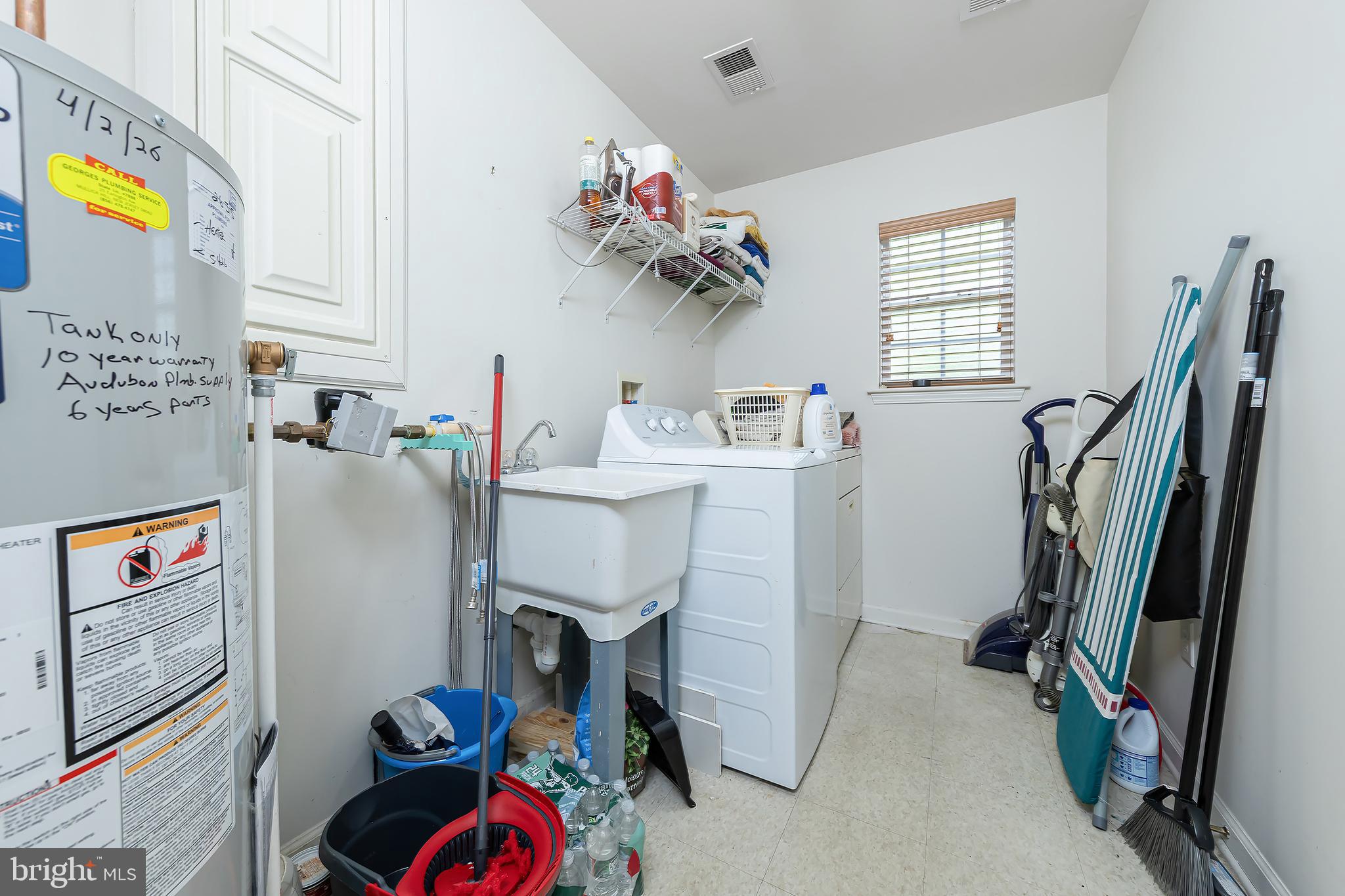 30 Brattleboro Road Swedesboro, NJ 08085 - Photo 22 of 33 Laundry Room w/ Utility Tub/New Water Heater Tank