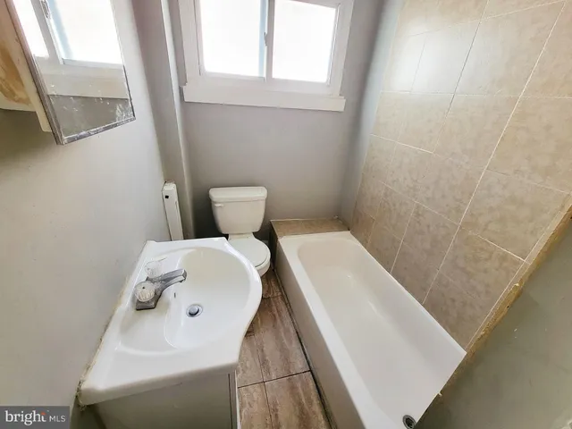 a bathroom with a sink and toilet