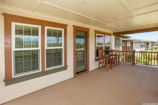 a view of livingroom with furniture and floor to ceiling window