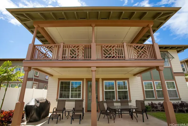 a view of a building with sitting area