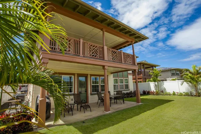 a view of a chairs and table in patio