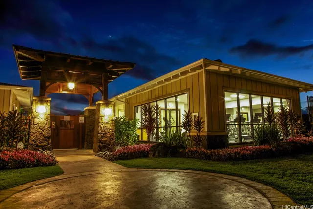a view of a house with a yard porch and sitting area