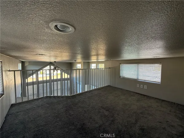 a bathroom with a shower and a mirror