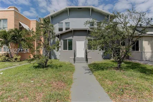 a house with lots of trees