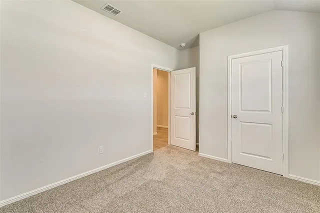 an empty room with an entryway