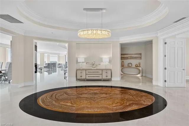 a view of a livingroom with furniture and front door