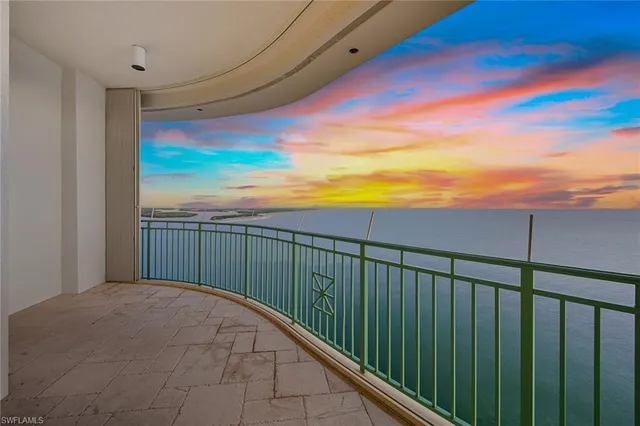 a view of balcony with furniture