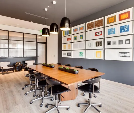 a view of a workspace with furniture