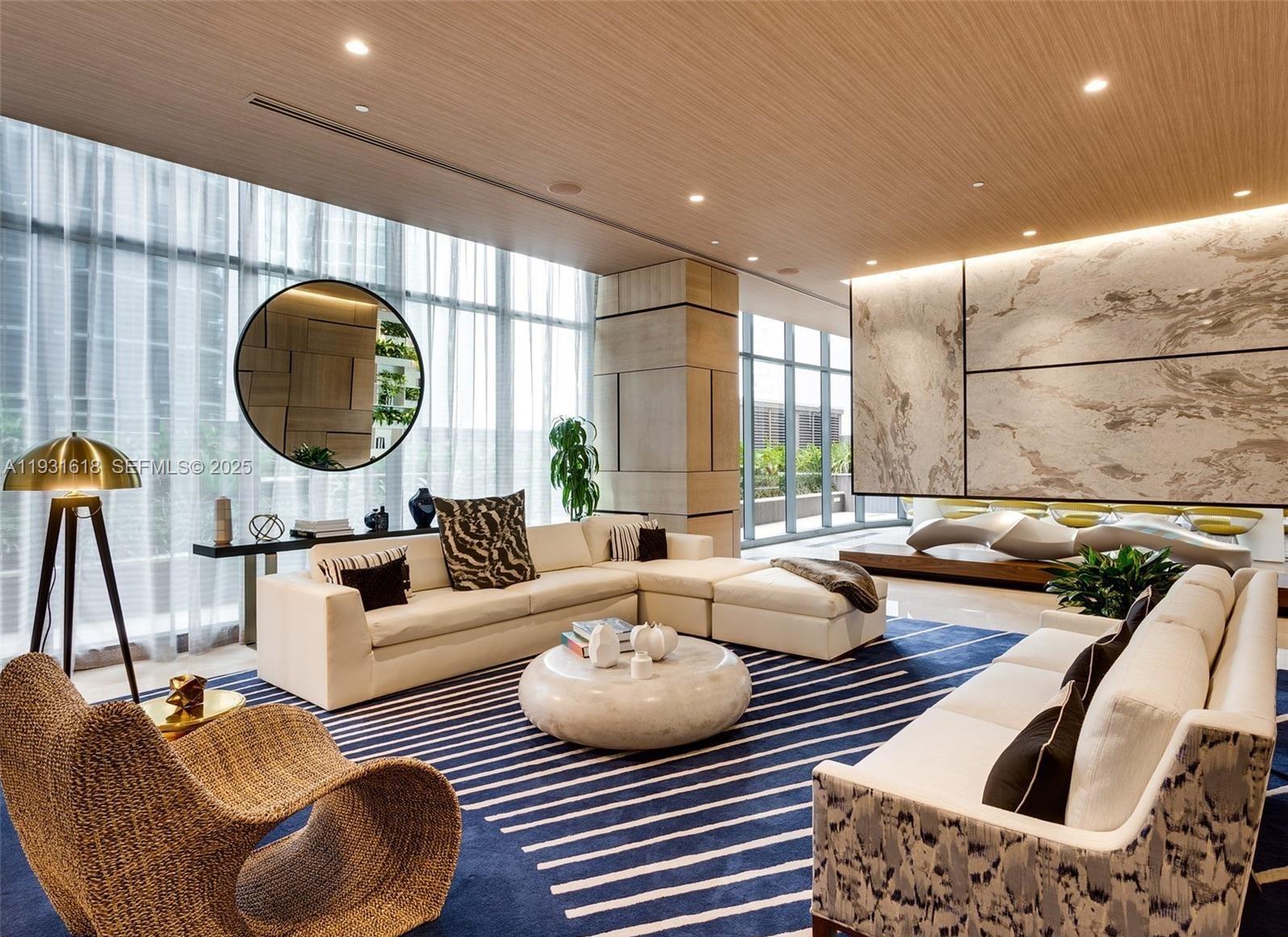 55 Southwest 9th Street, Unit 3707 Miami, FL 33130 - Photo 25 of 25 a living room with furniture and a large window