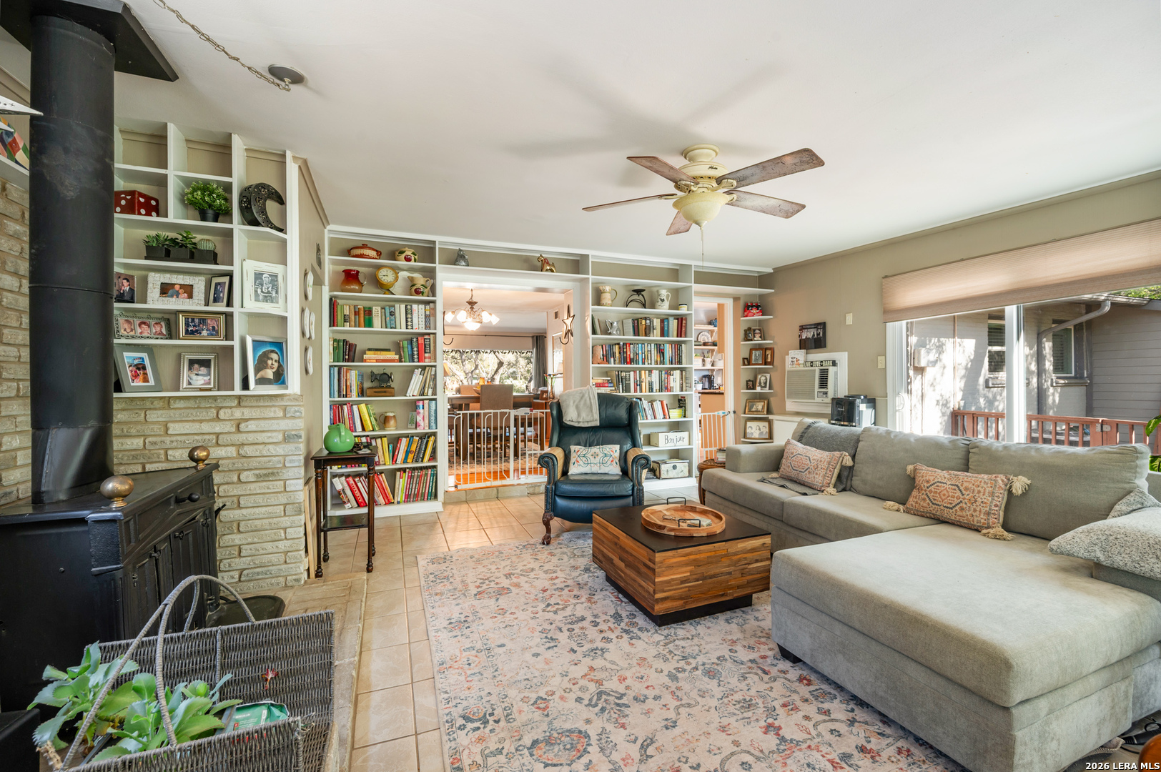 114 Wagon Trail Road Shavano Park, TX 78231 - Photo 19 of 36 a living room with furniture and floor to ceiling windows