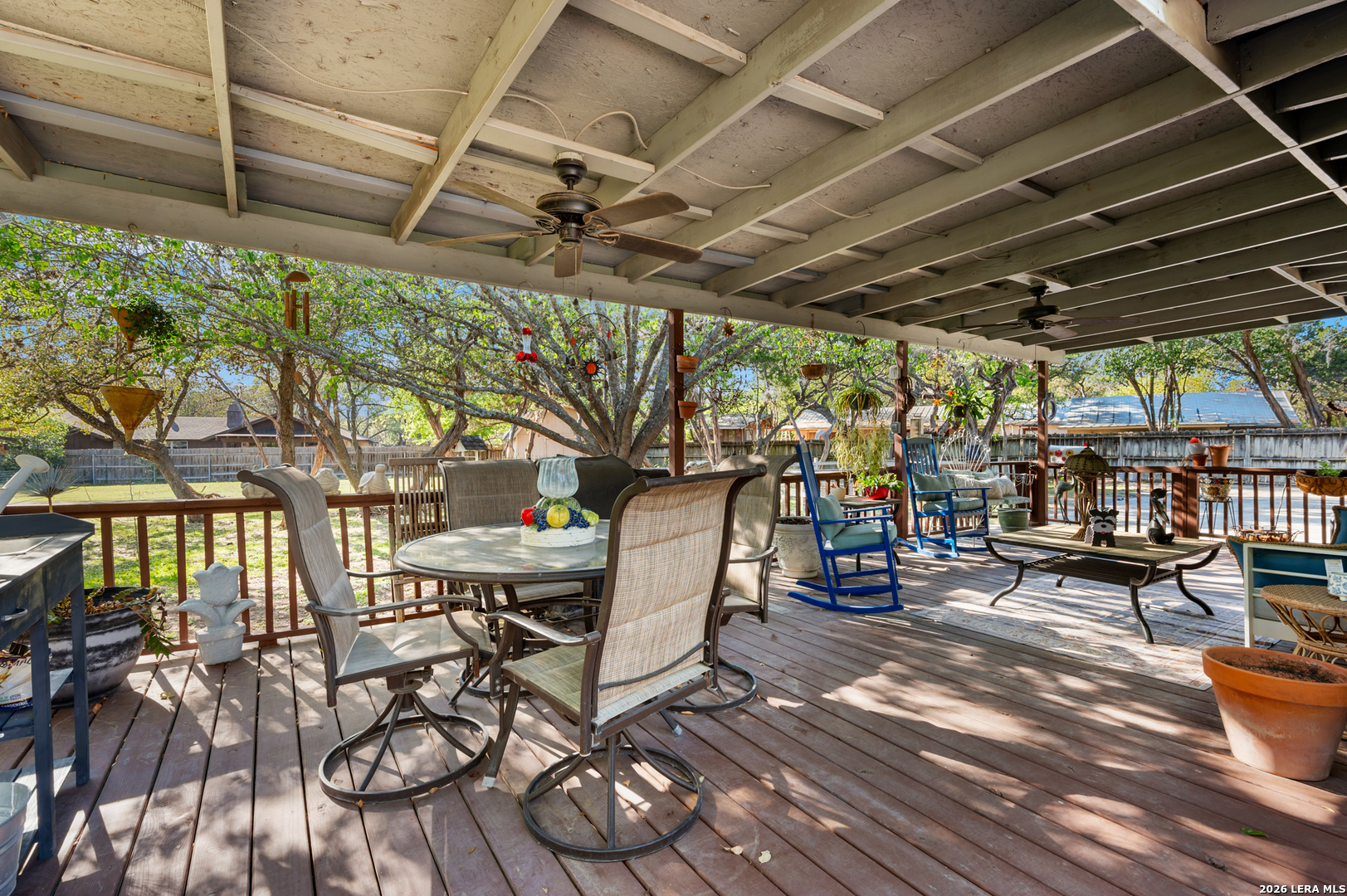114 Wagon Trail Road Shavano Park, TX 78231 - Photo 31 of 36 a view of a chairs and table in a patio