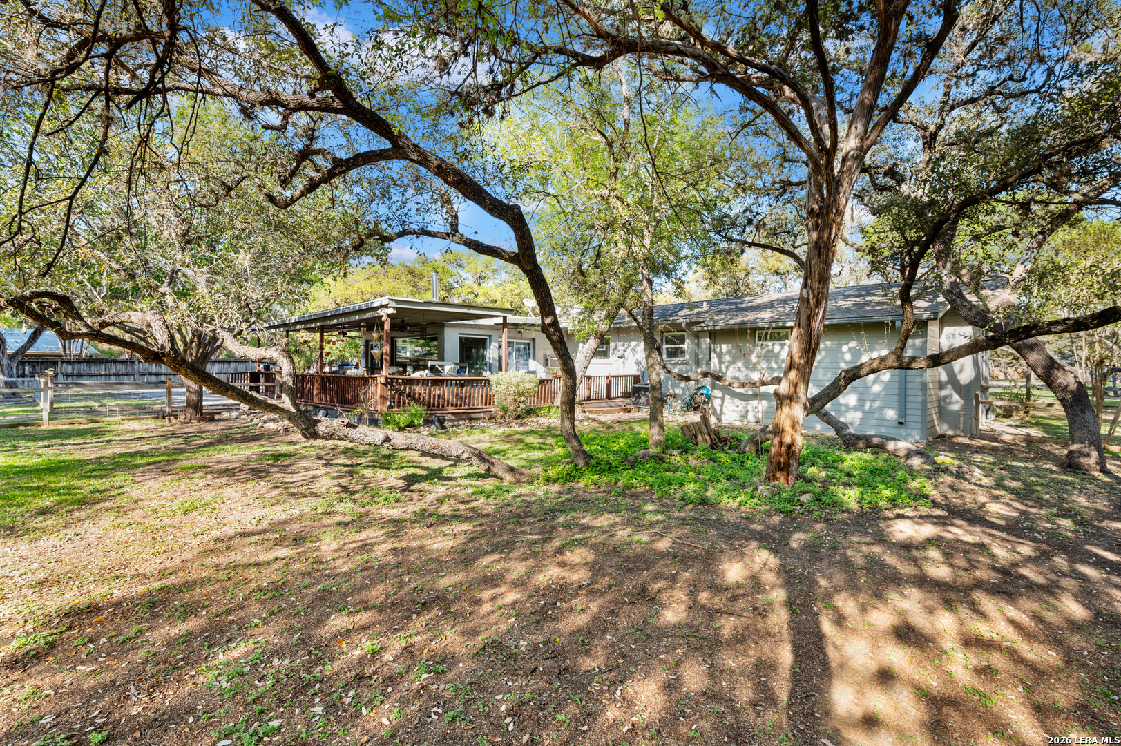 114 Wagon Trail Road Shavano Park, TX 78231 - Photo 34 of 36 a view of a house with a yard