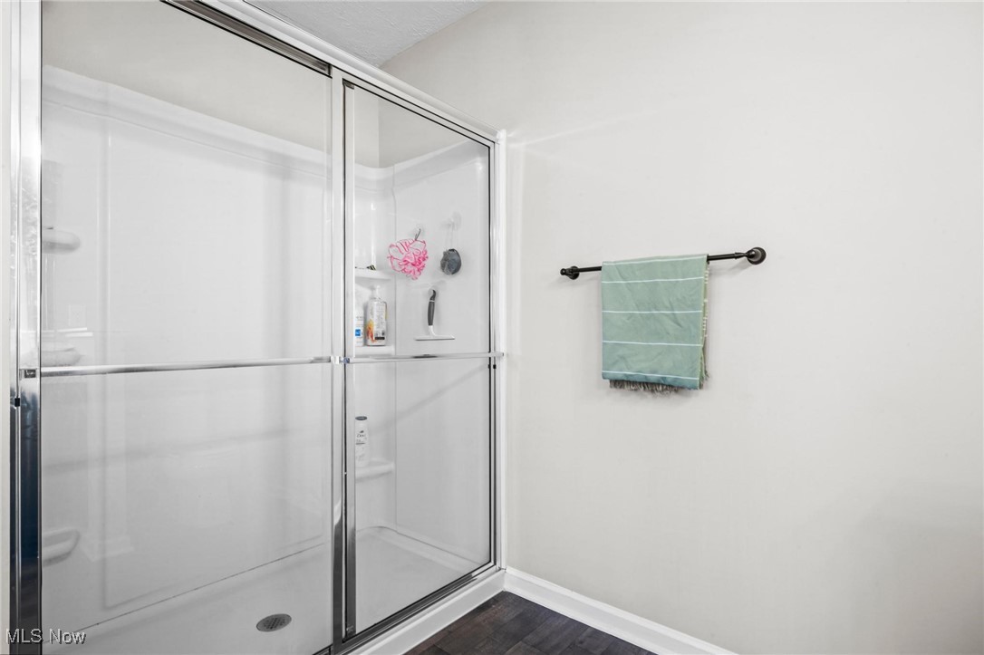 37174 Amber Way North Ridgeville, OH 44039 - Photo 20 of 40 Full bath with a shower with door and wood finished floors