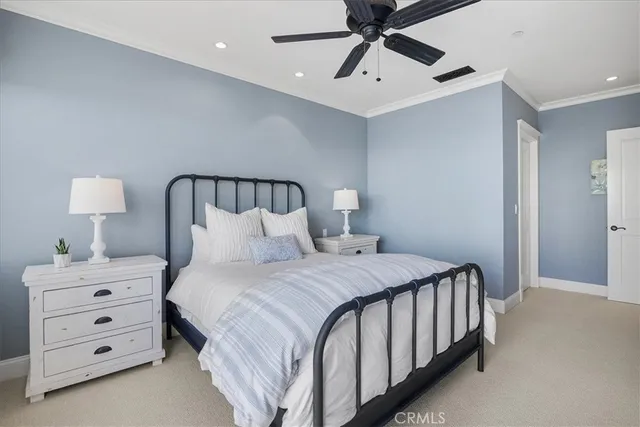 a view of a roof deck with table and chairs