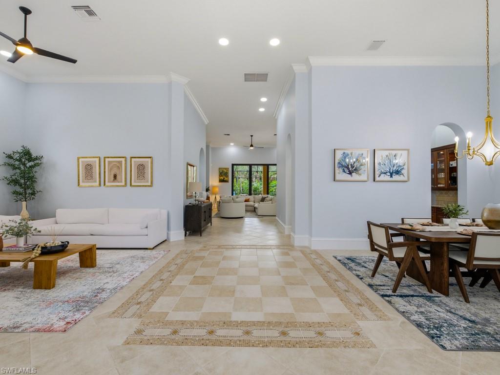 18091 Lagos Way Naples, FL 34110 - Photo 6 of 50 a living room with furniture