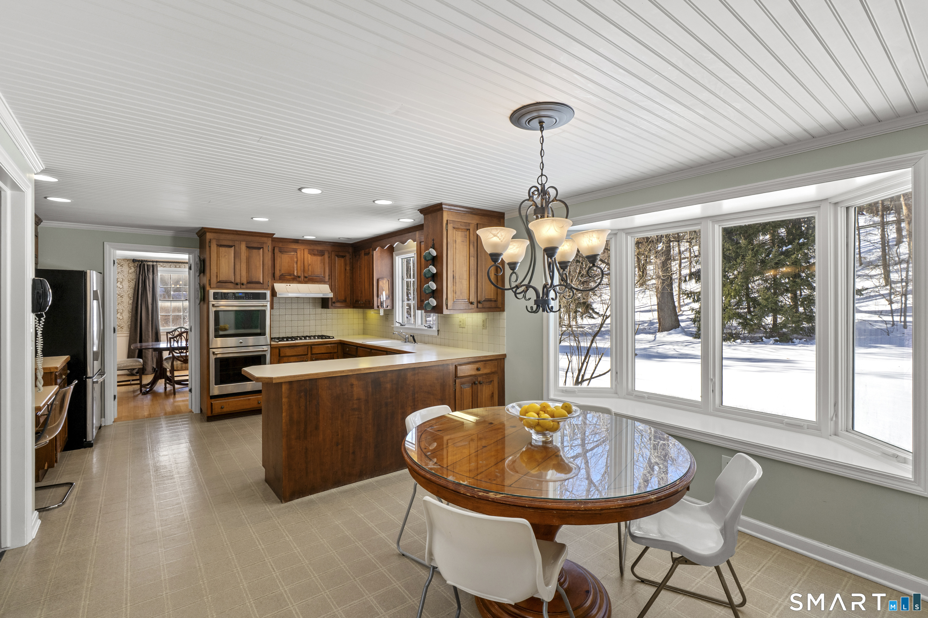 60 Berwyn Road West Hartford, CT 06117 - Photo 12 of 40 Plenty of space in the eat in kitchen with an oversized bay window overlooking the large backyard