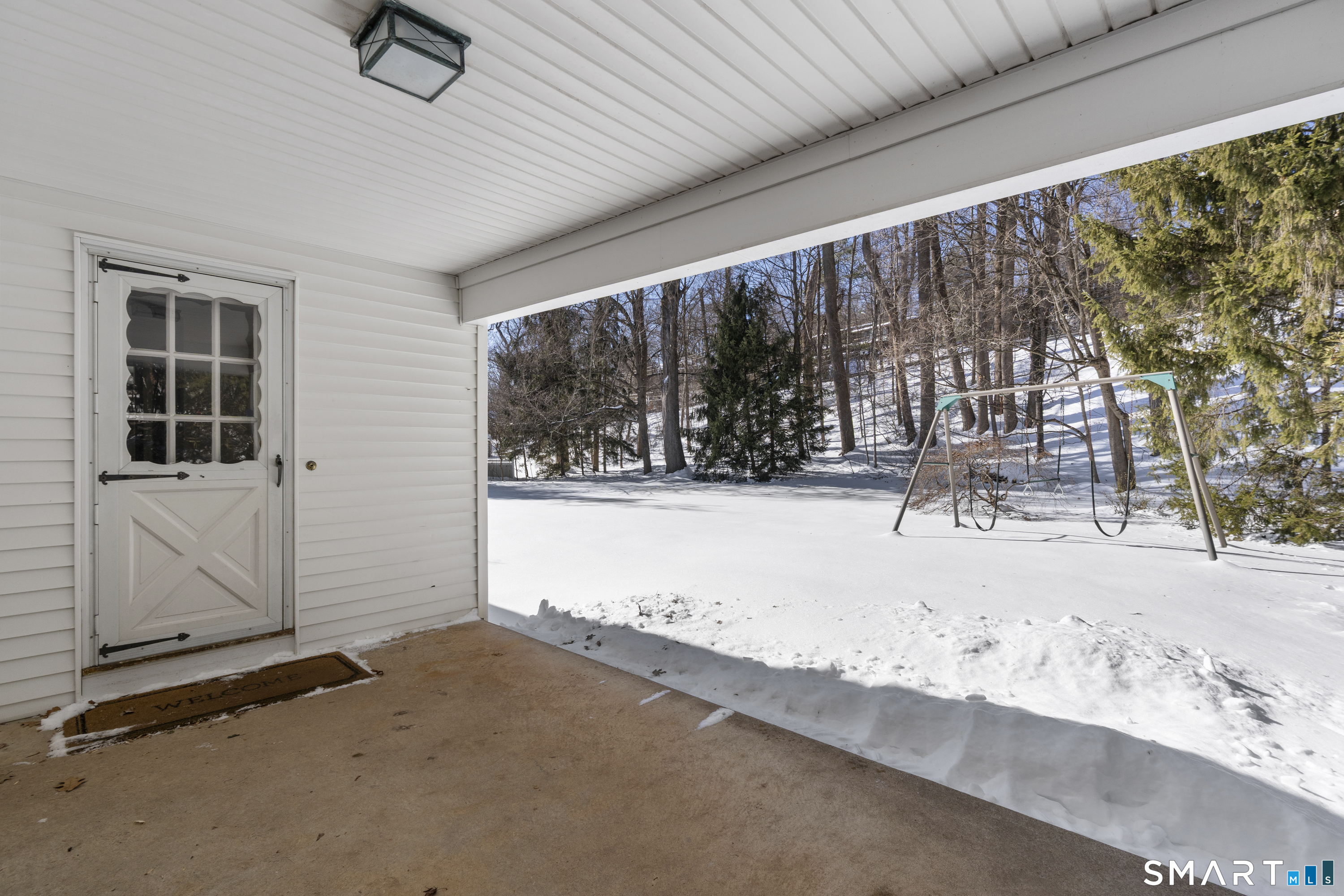 60 Berwyn Road West Hartford, CT 06117 - Photo 16 of 40 Stay dry when you exit the garage and enter the mudroom from the covered patio