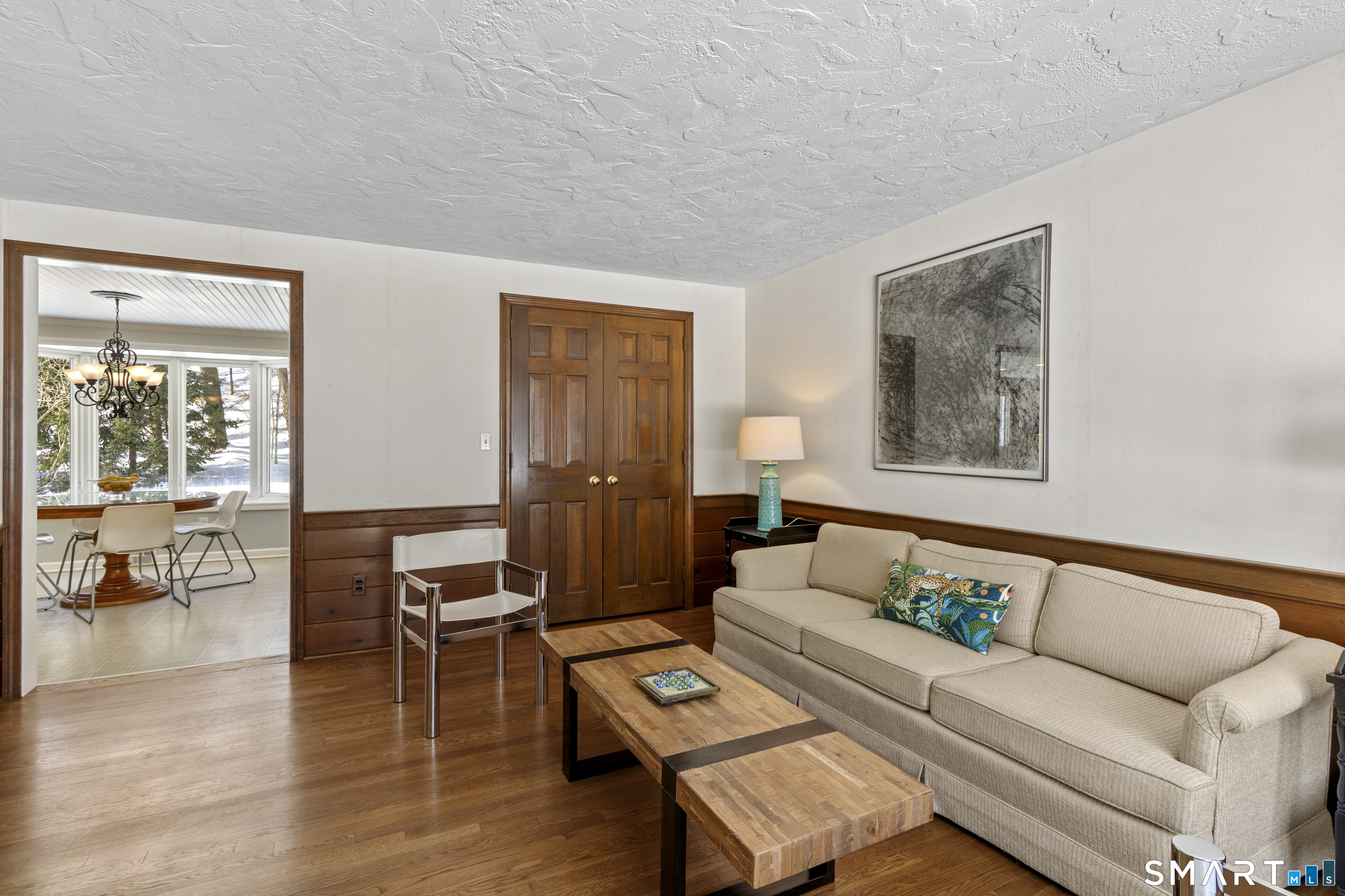 60 Berwyn Road West Hartford, CT 06117 - Photo 17 of 40 Family room with large closet and wood floors