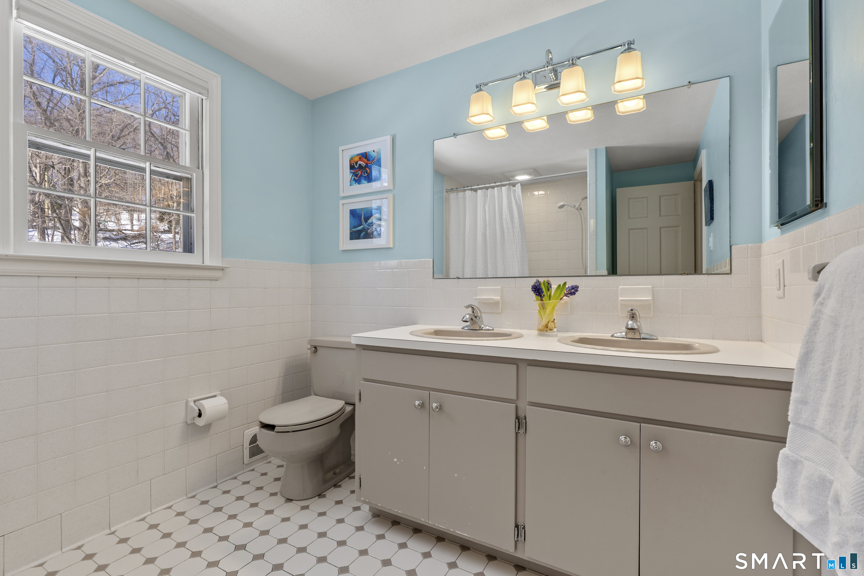 60 Berwyn Road West Hartford, CT 06117 - Photo 30 of 40 Full bathroom with double sinks and tub/shower combination