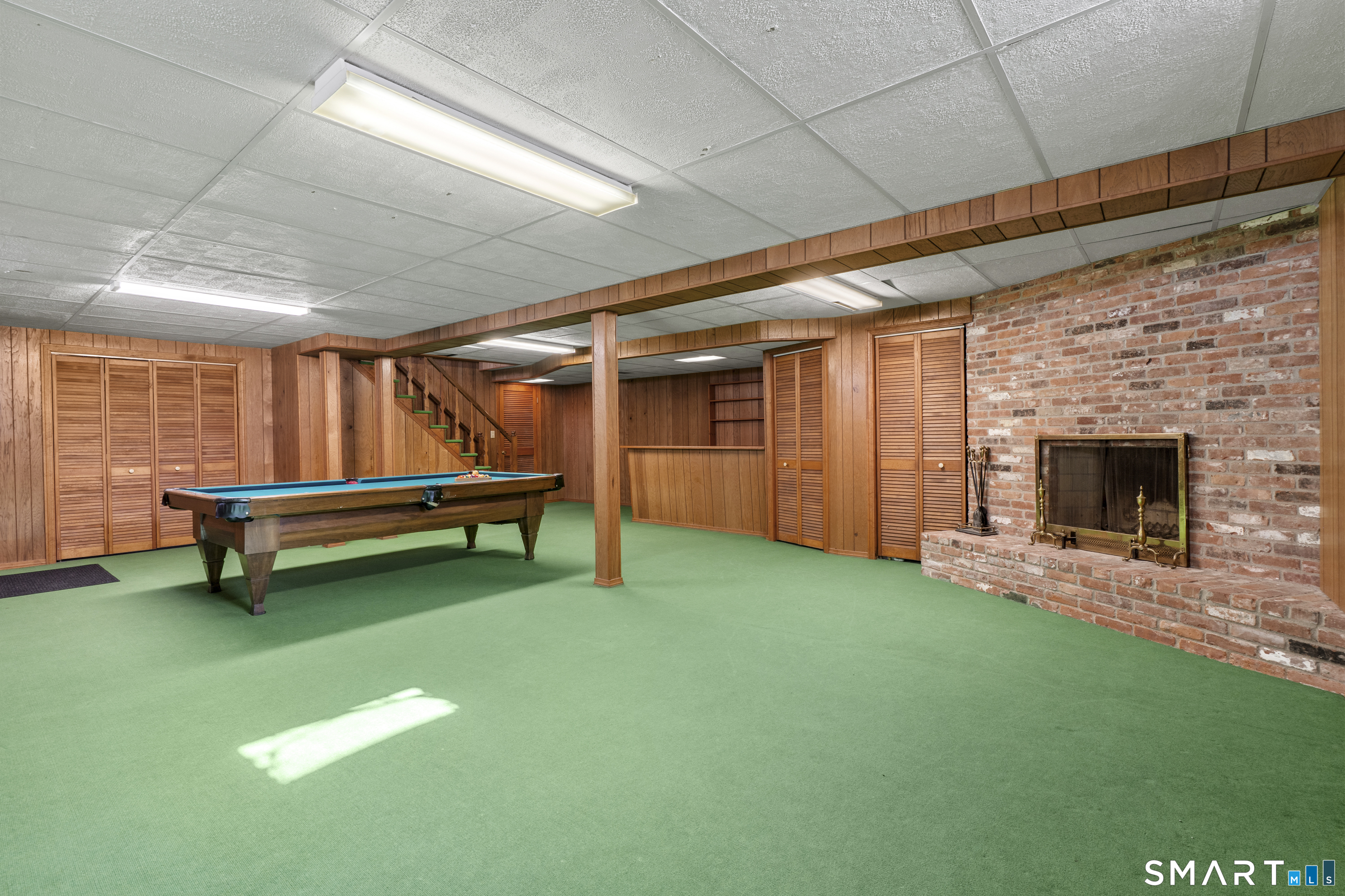 60 Berwyn Road West Hartford, CT 06117 - Photo 32 of 40 Spacious basement with fireplace and tons of storage