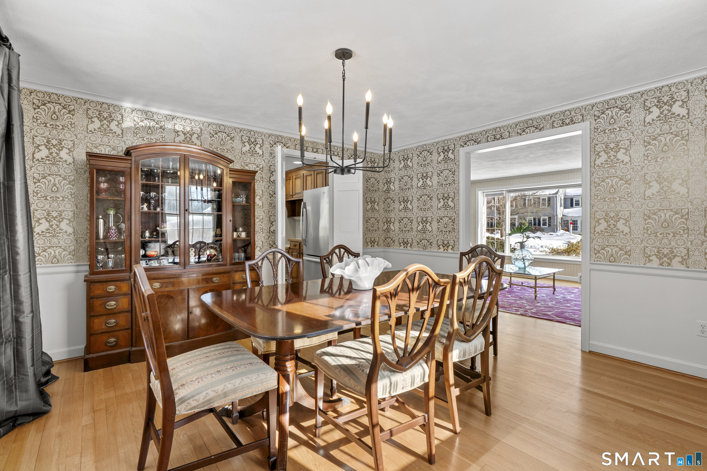 60 Berwyn Road West Hartford, CT 06117 - Photo 7 of 40 Pretty dining room with chair rail situated between the living room and kitchen - perfect for entertaining
