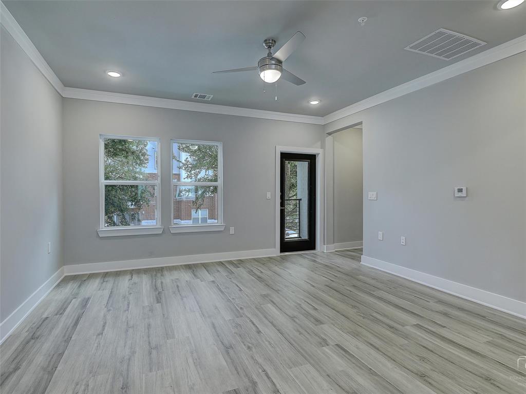 3345 Wynwood Drive Plano, TX 75074 - Photo 13 of 23 wooden floor in an empty room with a window