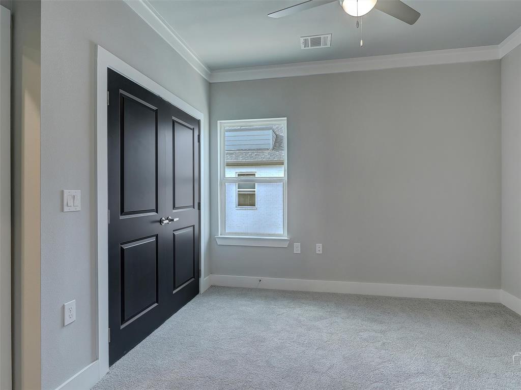3345 Wynwood Drive Plano, TX 75074 - Photo 9 of 23 an empty room with windows and closet