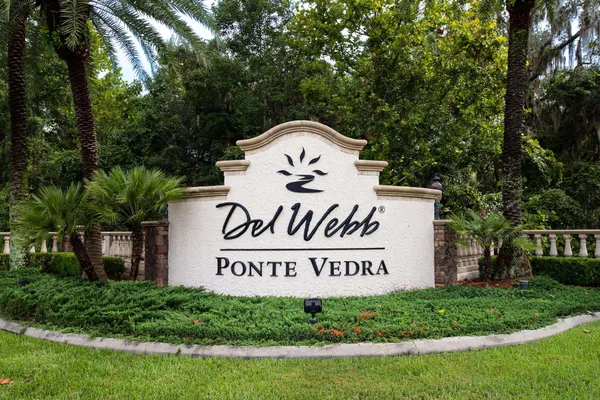 a sign on the side of a road