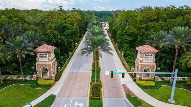 swimming pool view with a garden and trees