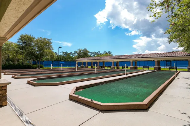 a view of a swimming pool with a patio