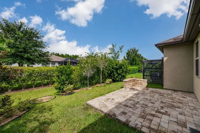 a view of a backyard with a garden