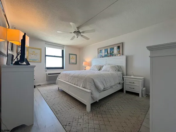 a bathroom with a sink vanity and a toilet