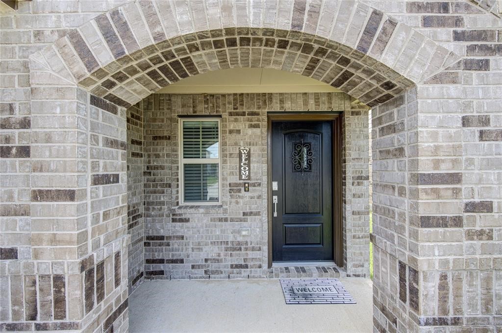 25519 Pitchfork Ranch Place Katy, TX 77493 - Photo 2 of 31 a front view of a building