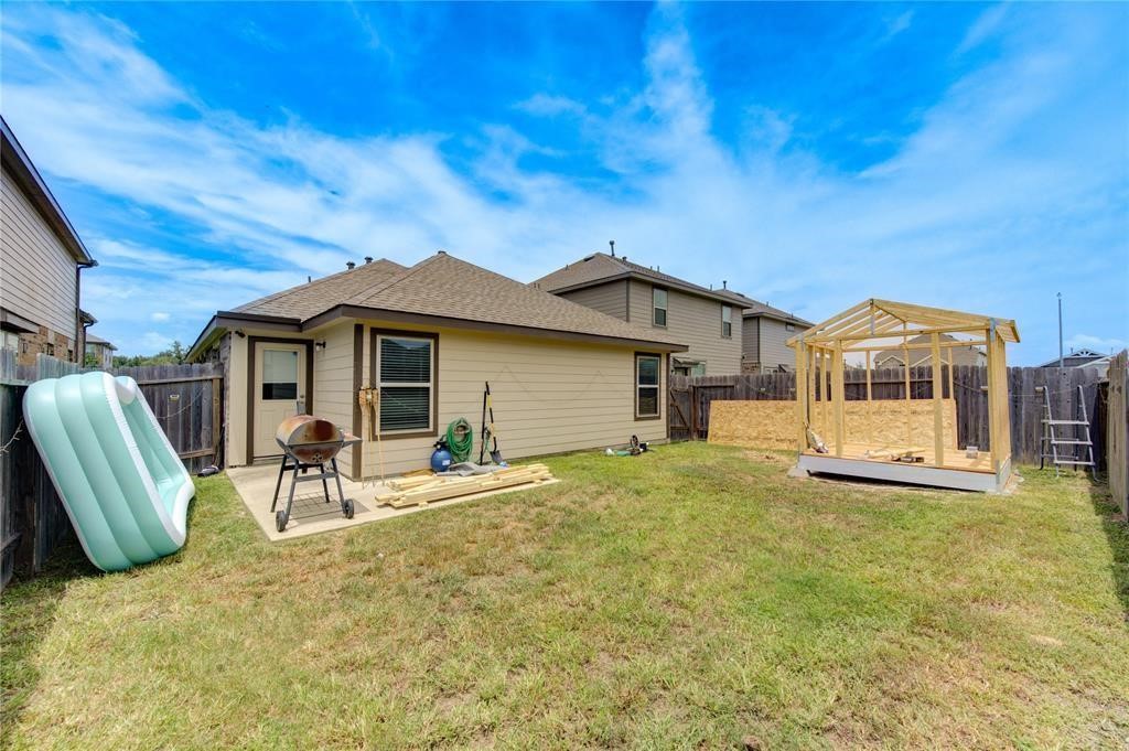 25519 Pitchfork Ranch Place Katy, TX 77493 - Photo 31 of 31 a house view with a garden space