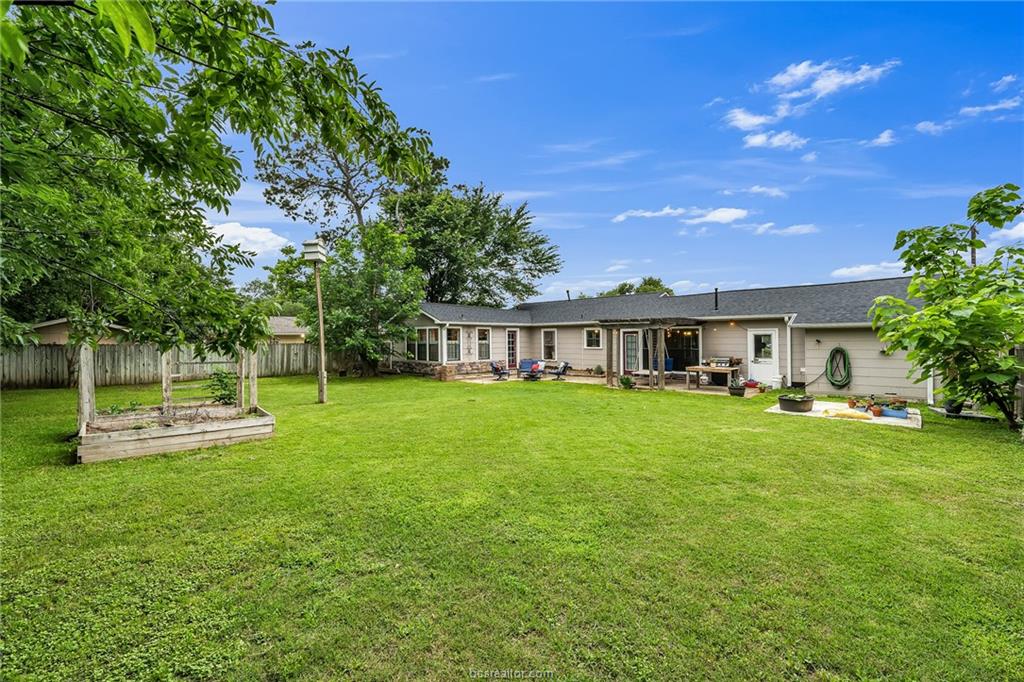 1414 East 29th Street Bryan, TX 77802 - Photo 20 of 21 a view of a house with a yard porch and sitting area