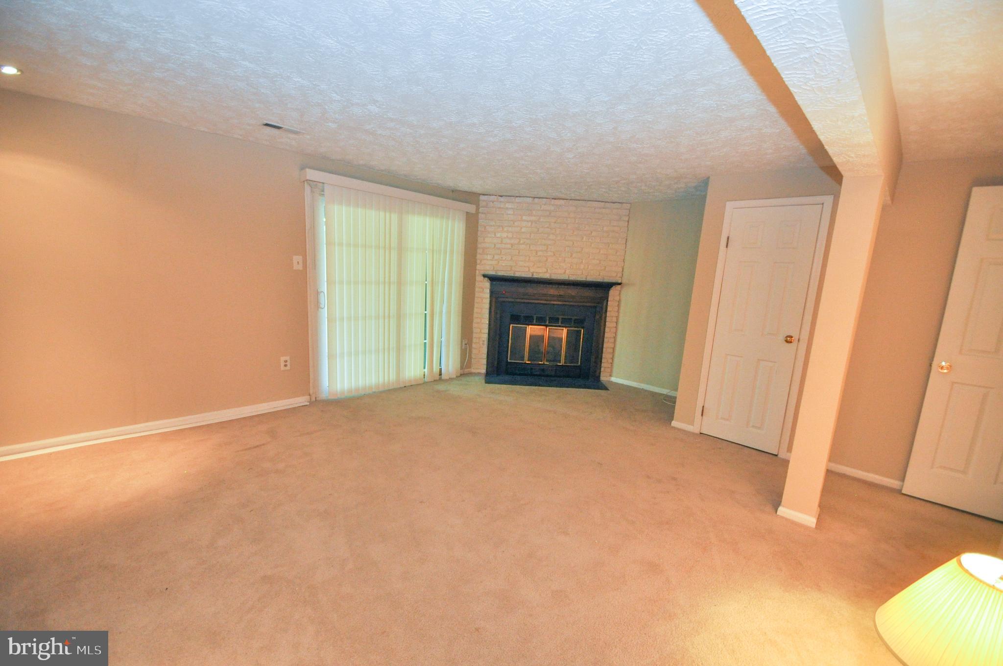 17 Greenleaf Road Baltimore, MD 21234 - Photo 20 of 28 Family room with slider to the rear patio and yard