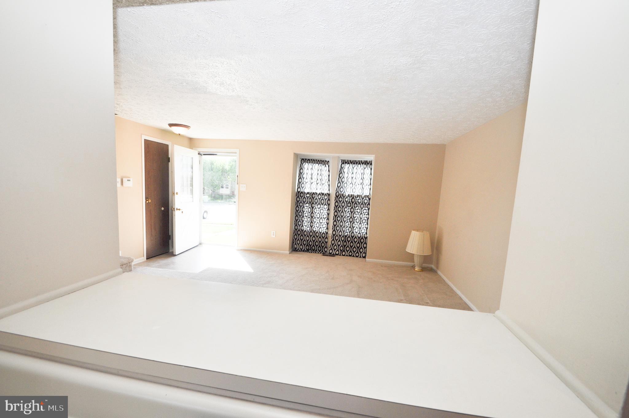 17 Greenleaf Road Baltimore, MD 21234 - Photo 5 of 28 Pass through to the living room.